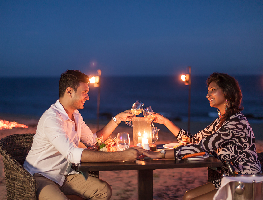 candlelight dinner on the beach at night