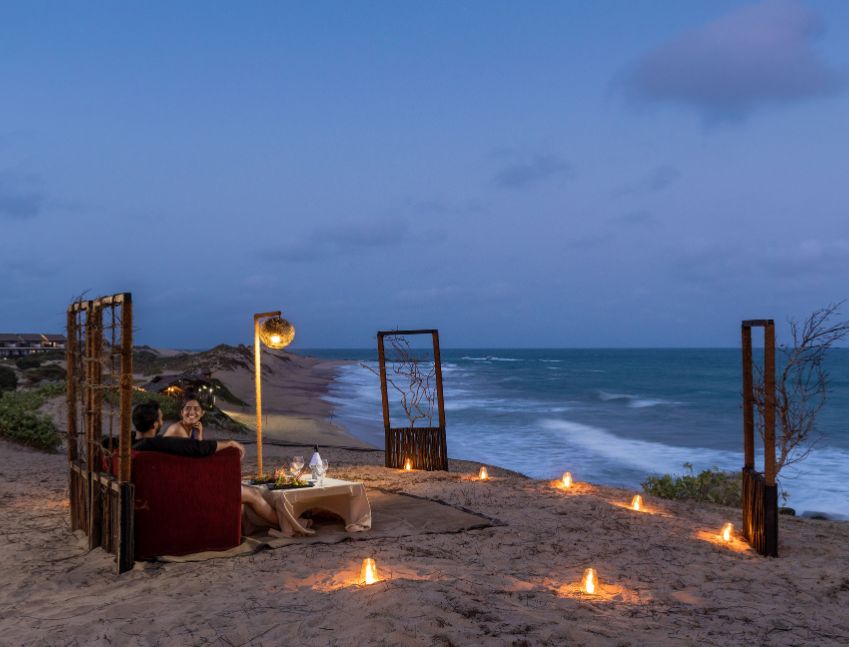 candlelight dinner on the beach at night